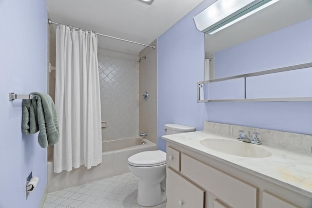 bathroom with shower / bathtub combination with curtain, vanity, and toilet