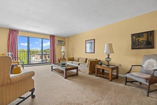 carpeted living room featuring a textured ceiling, a wall mounted air conditioner, and baseboards