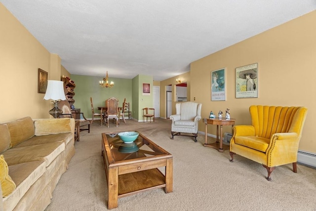 carpeted living area with a chandelier and a baseboard heating unit