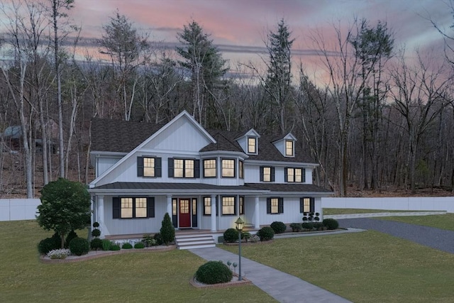 6 Meadow Rd, Bolton, MA 01740 - view of front facade featuring covered porch and asphalt driveway