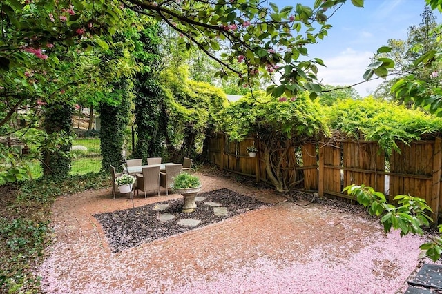 view of patio / terrace with fence and outdoor dining area