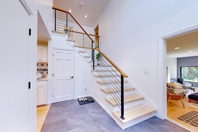 32 Garvey Rd, Framingham, MA 01701 - staircase with recessed lighting and baseboards