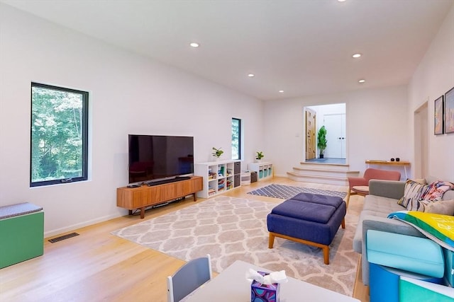 32 Garvey Rd, Framingham, MA 01701 - living area with wood finished floors, recessed lighting, and baseboards