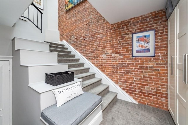 265 Beacon St Unit 5, Boston, MA 02116 - staircase with brick wall and a towering ceiling