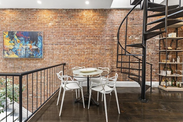 265 Beacon St Unit 5, Boston, MA 02116 - dining room featuring brick wall, baseboards, recessed lighting, and wood finished floors