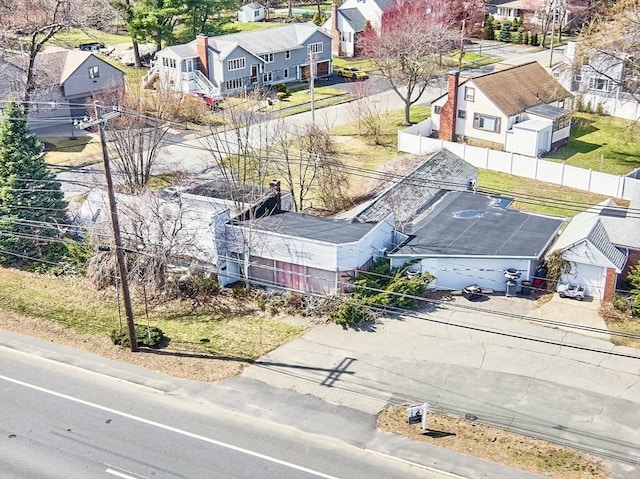 birds eye view of property with a residential view
