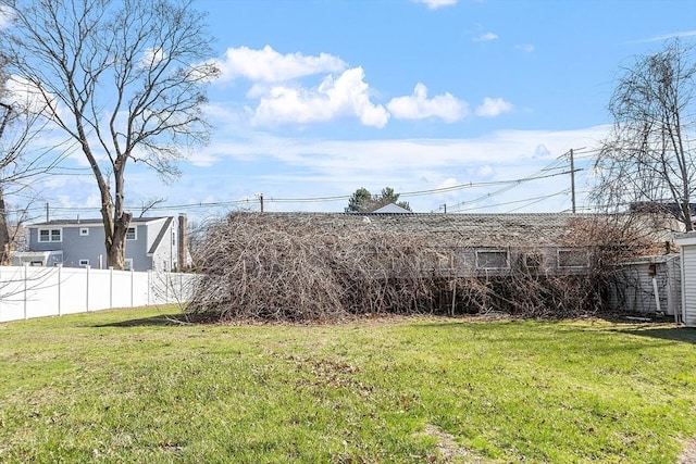 view of yard with fence
