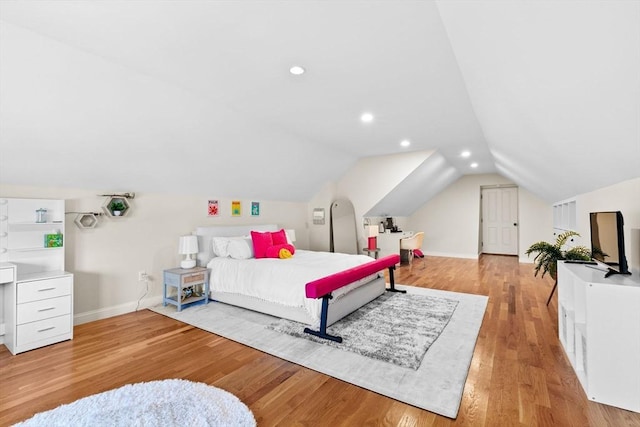 bedroom featuring lofted ceiling, recessed lighting, light wood-style floors, and baseboards