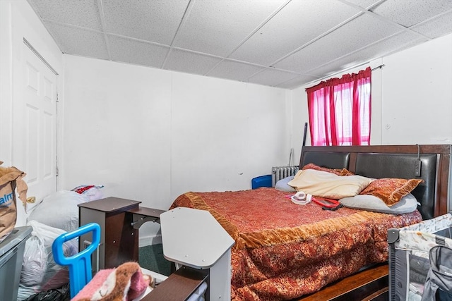 bedroom featuring a paneled ceiling