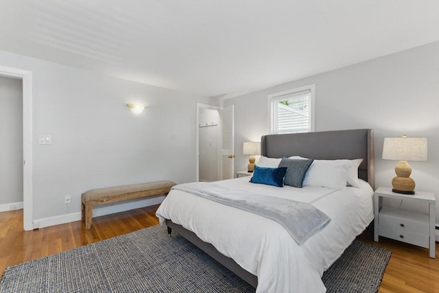 90 Woodland Rd, Malden, MA 02148 - bedroom with wood finished floors and baseboards
