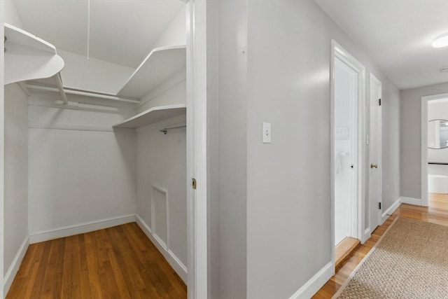 90 Woodland Rd, Malden, MA 02148 - spacious closet featuring wood finished floors