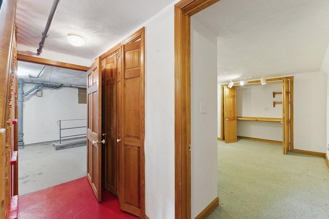 90 Woodland Rd, Malden, MA 02148 - hall with rail lighting, carpet, and baseboards