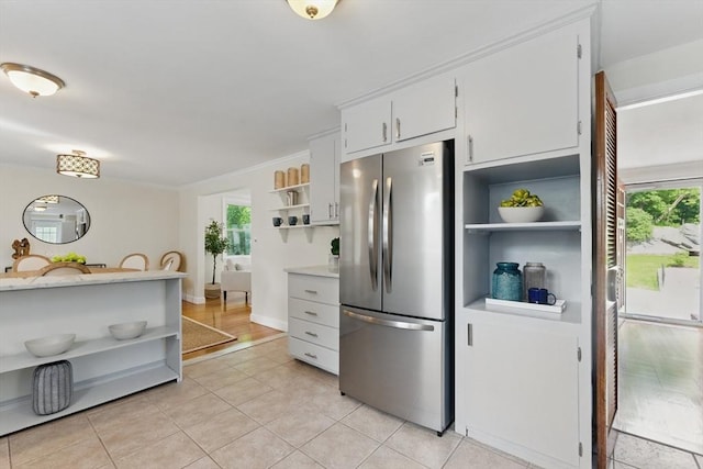 90 Woodland Rd, Malden, MA 02148 - kitchen featuring open shelves, freestanding refrigerator, light tile patterned flooring, and plenty of natural light