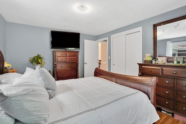 389 Porter Rd, East Longmeadow, MA 01028 - bedroom featuring wood finished floors and a closet