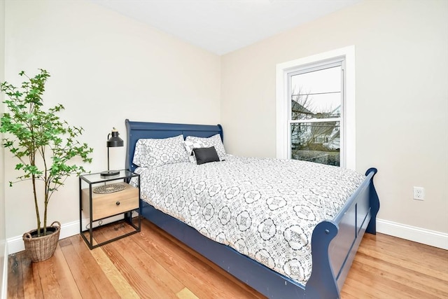 bedroom featuring hardwood / wood-style flooring