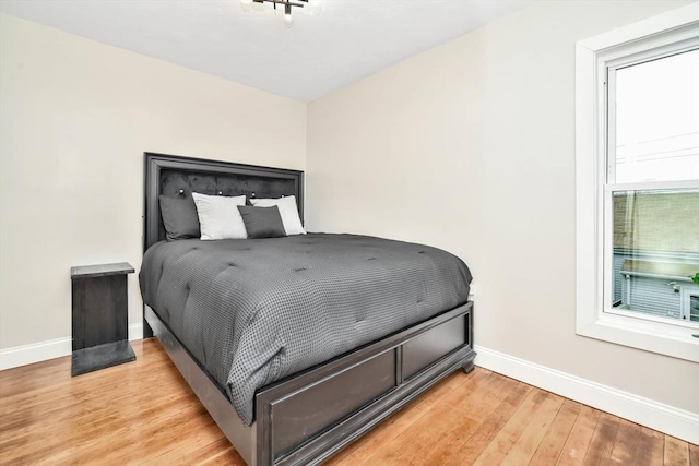 bedroom featuring light hardwood / wood-style floors