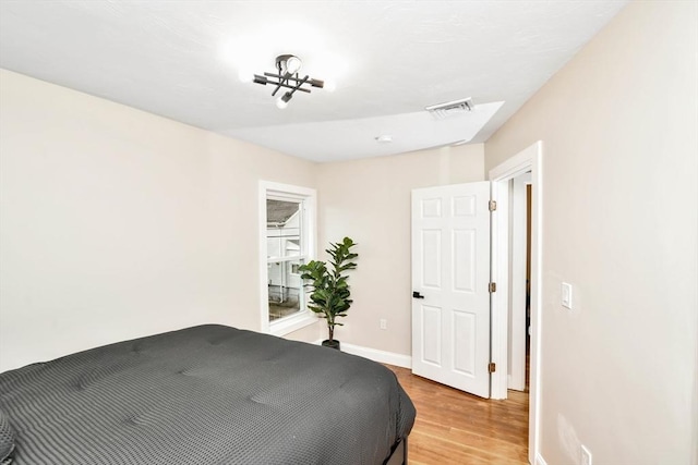 bedroom featuring light hardwood / wood-style floors