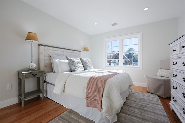 bedroom featuring dark hardwood / wood-style floors