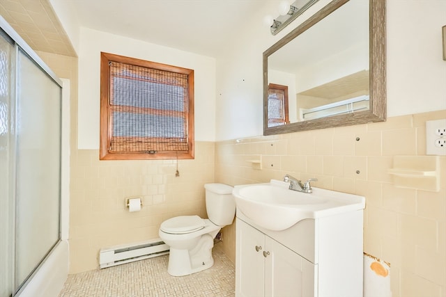 full bathroom with tile walls, tile patterned flooring, baseboard heating, vanity, and toilet