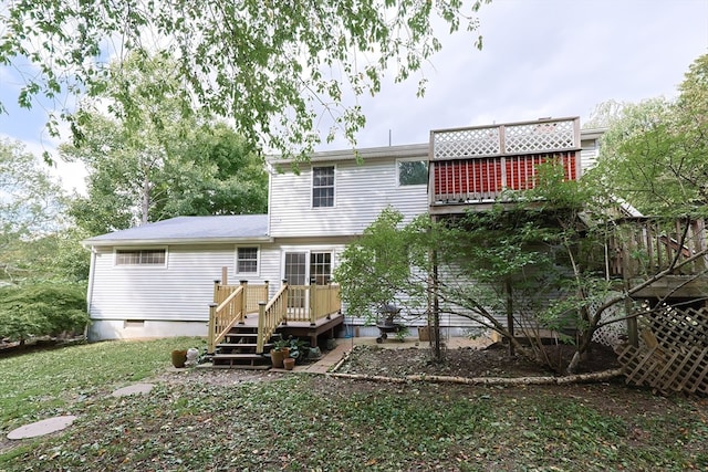 rear view of property with a deck