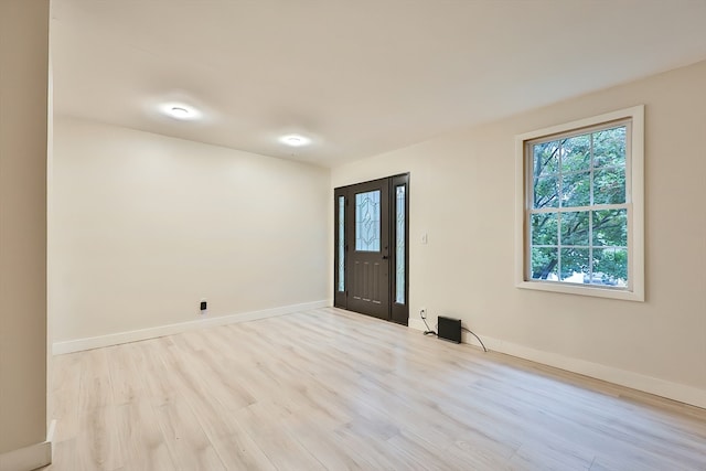 foyer with light wood-type flooring