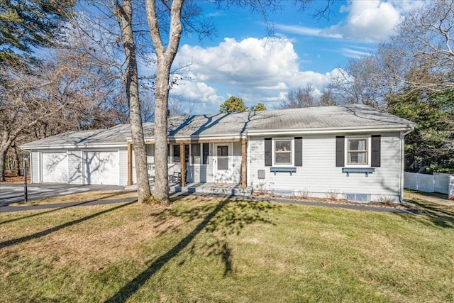 single story home featuring a garage, a porch, and a front yard