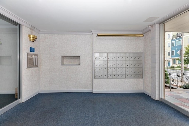 carpeted empty room with mail boxes and ornamental molding