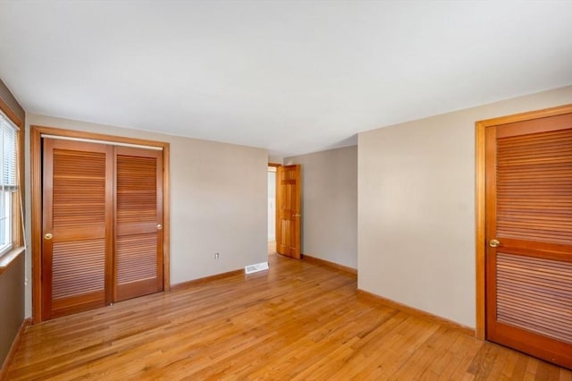 empty room with light wood-type flooring