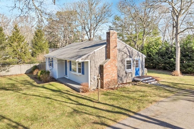 view of home's exterior featuring a yard