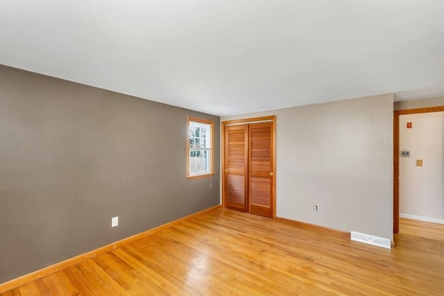 empty room featuring light hardwood / wood-style flooring