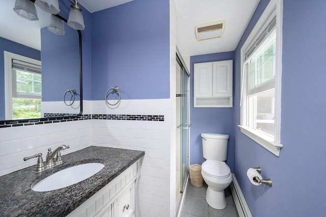 11 Williamsburg Ln, Scituate, MA 02066 - full bath featuring a stall shower, vanity, tile patterned flooring, and tile walls