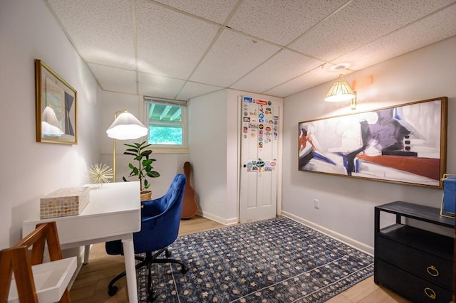 11 Williamsburg Ln, Scituate, MA 02066 - home office with a paneled ceiling and baseboards