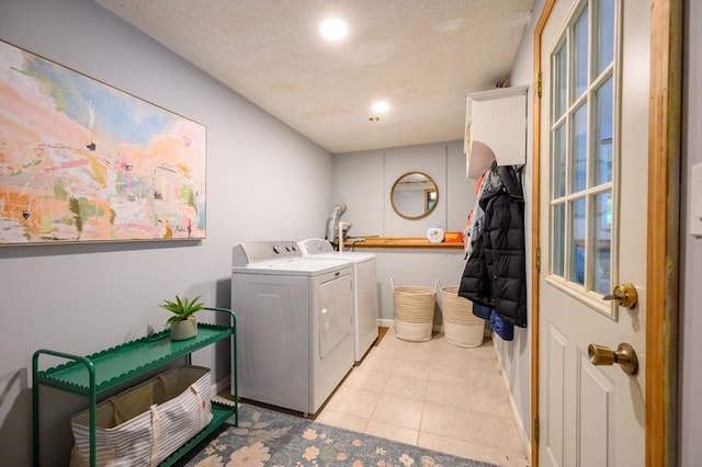 11 Williamsburg Ln, Scituate, MA 02066 - laundry room featuring washing machine and clothes dryer, recessed lighting, a textured ceiling, and light tile patterned floors