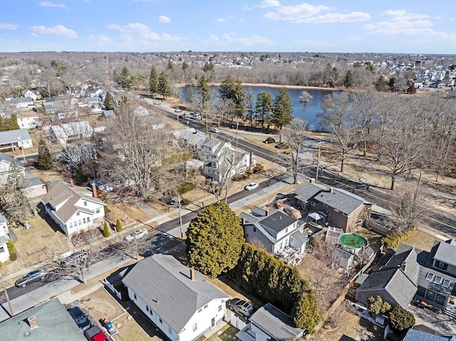 birds eye view of property with a residential view and a water view