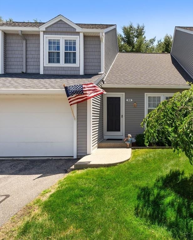 84 Chapin Greene Unit 84, Ludlow, MA 01056 - view of front of property with a front lawn, a shingled roof, an attached garage, and driveway