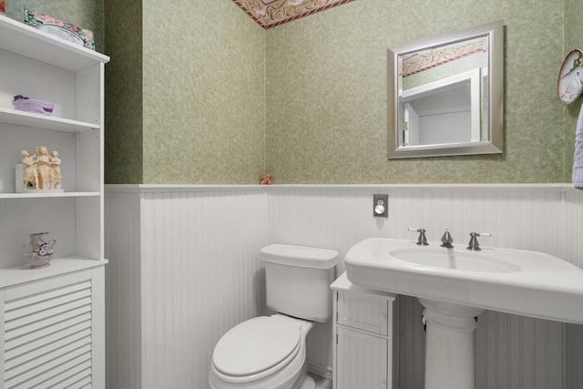 84 Chapin Greene Unit 84, Ludlow, MA 01056 - half bathroom with wallpapered walls and a wainscoted wall