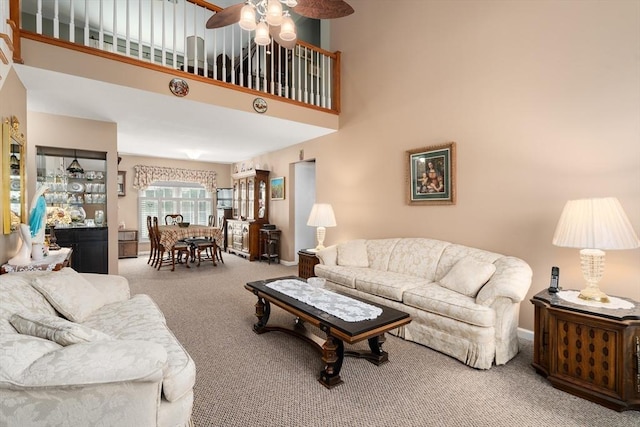 84 Chapin Greene Unit 84, Ludlow, MA 01056 - living room with carpet floors, a high ceiling, and a ceiling fan