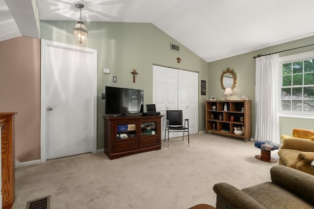 84 Chapin Greene Unit 84, Ludlow, MA 01056 - living area with light carpet and lofted ceiling