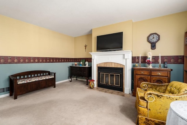 84 Chapin Greene Unit 84, Ludlow, MA 01056 - living area with carpet floors and a tiled fireplace