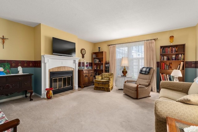 84 Chapin Greene Unit 84, Ludlow, MA 01056 - living area featuring a fireplace and carpet floors