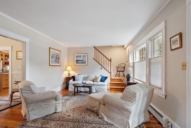 4 Pleasant View St, Methuen, MA 01844 - living area featuring stairs, ornamental molding, wood finished floors, and baseboards