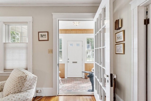 4 Pleasant View St, Methuen, MA 01844 - foyer featuring ornamental molding and a wainscoted wall