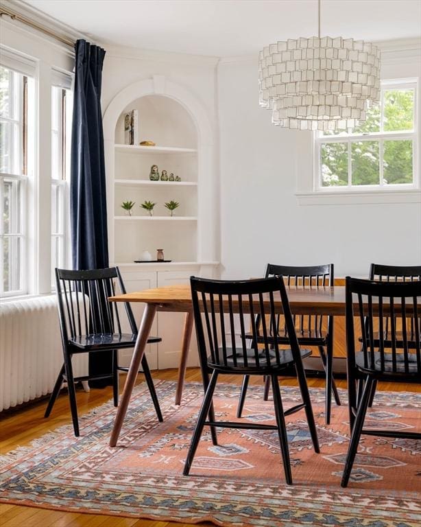 96 Nonantum St, Newton, MA 02458 - dining room featuring wood finished floors and ornamental molding