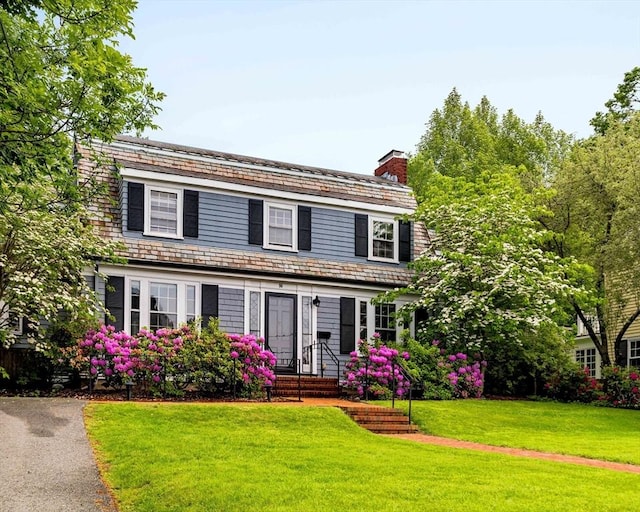 96 Nonantum St, Newton, MA 02458 - view of front of property featuring a chimney, a front lawn, and a high end roof