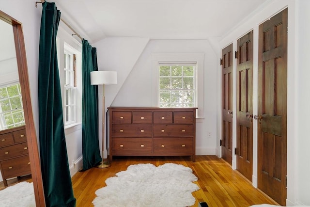 96 Nonantum St, Newton, MA 02458 - bedroom featuring light wood-style floors, lofted ceiling, and baseboards