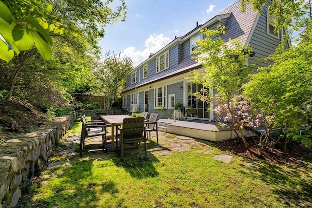 96 Nonantum St, Newton, MA 02458 - rear view of property with a deck, a chimney, and outdoor dining space