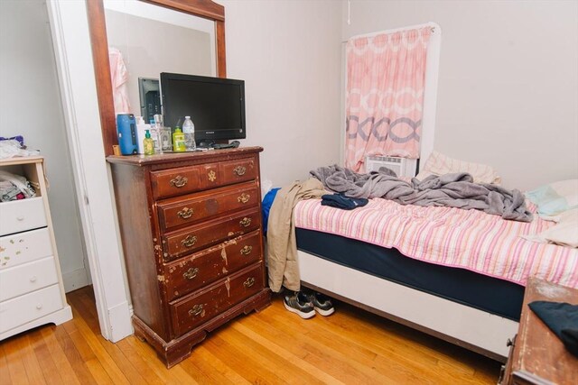 bedroom with light wood-style flooring