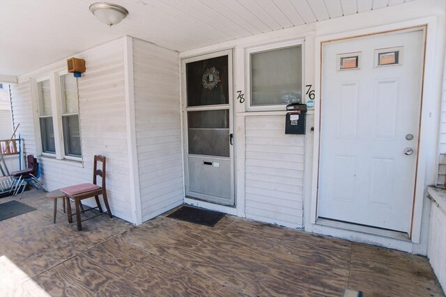 property entrance with a porch