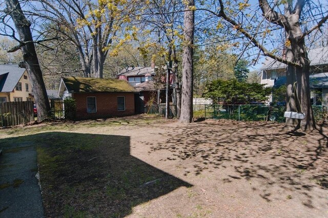 view of yard with fence