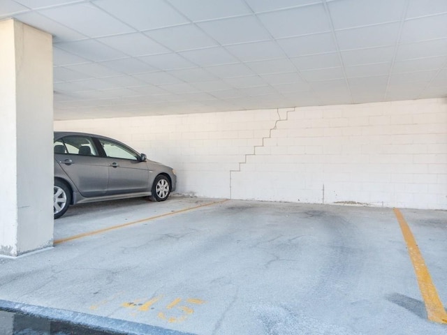 10 Williams St Unit 79, Watertown, MA 02472 - parking garage featuring concrete block wall